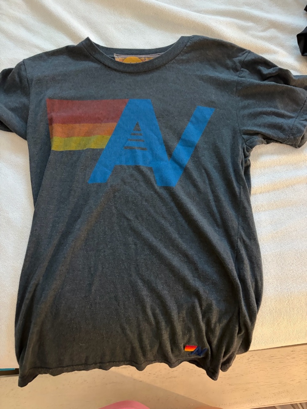 Aviator Nation Charcoal Tee with Blue Logo and Red-Orange-Yellow Stripe